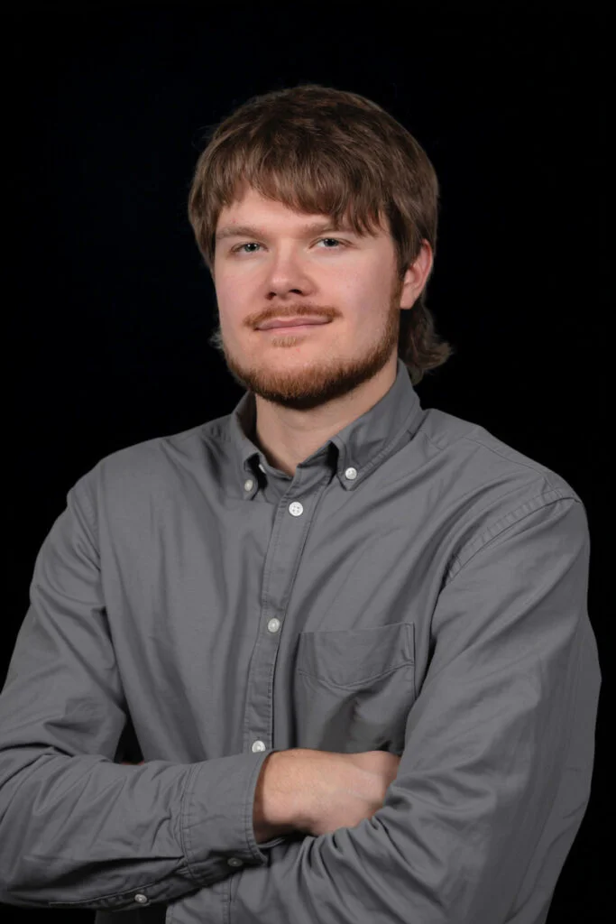 Headshot portrait of Robert Kamarali